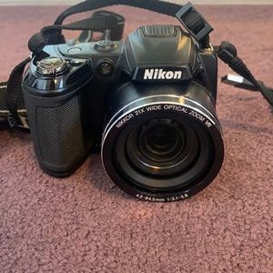 Nikon digital camera with strap, camera bag and wire